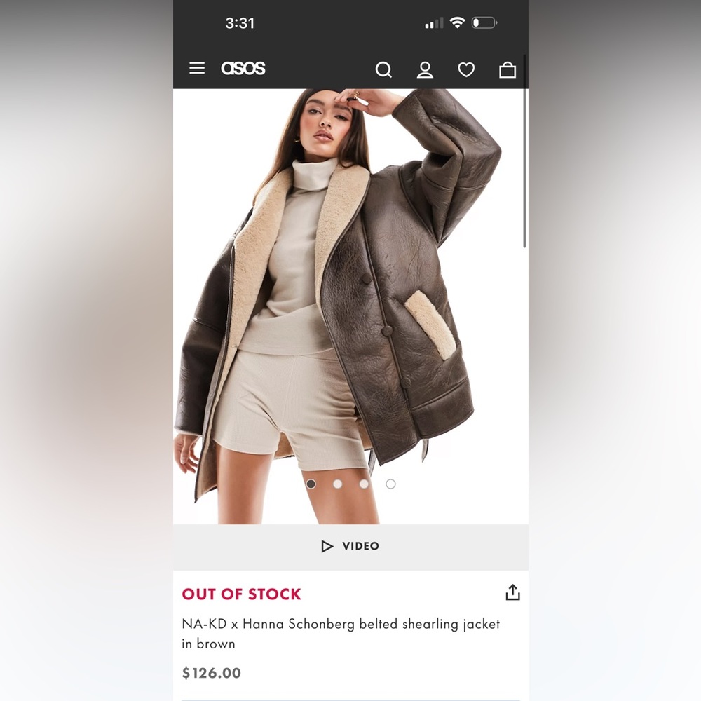 NA-KD x Hanna Schonberg belted shearling jacket in brown.   Sold out online